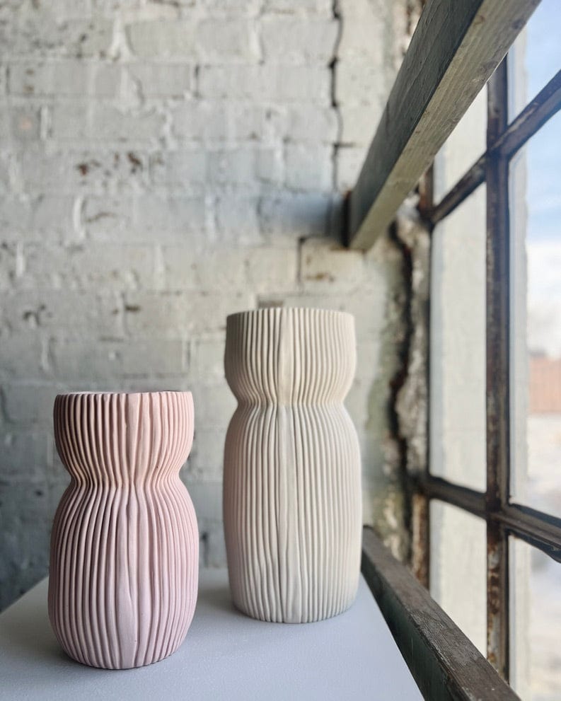Two textured vases, as seen in E4C1EE61-E736-4AD1-B499-1C839928864B